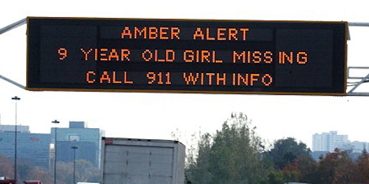 A missing child alert on highway signage